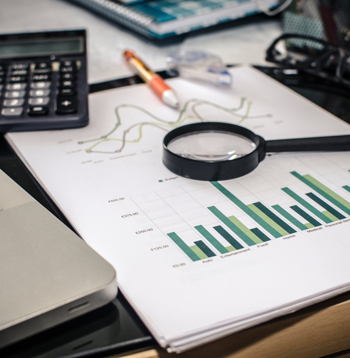 Professional digital marketing team discussing bespoke client strategies